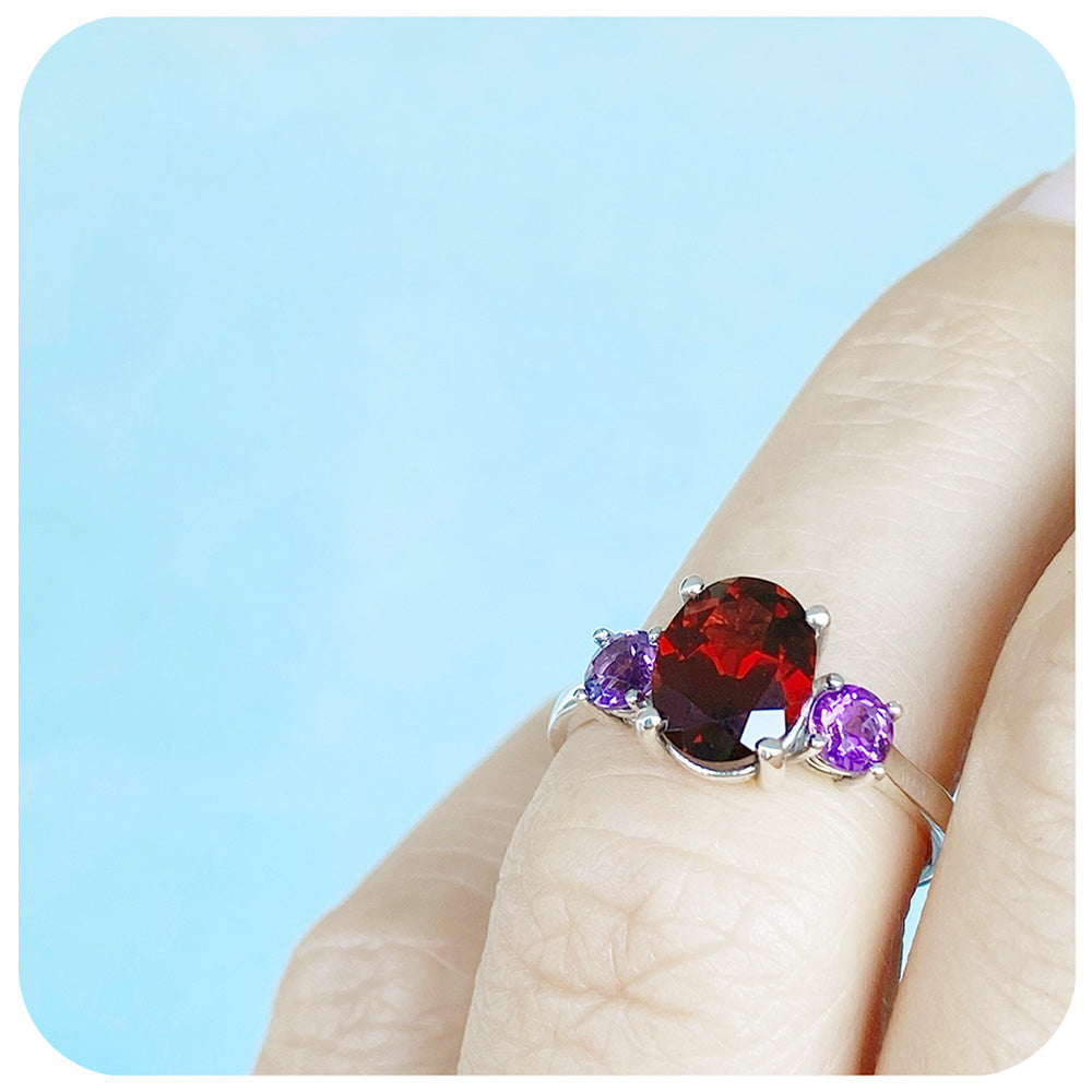 Oval cut Garnet and Amethyst Trilogy Anniversary Ring - Victoria's Jewellery