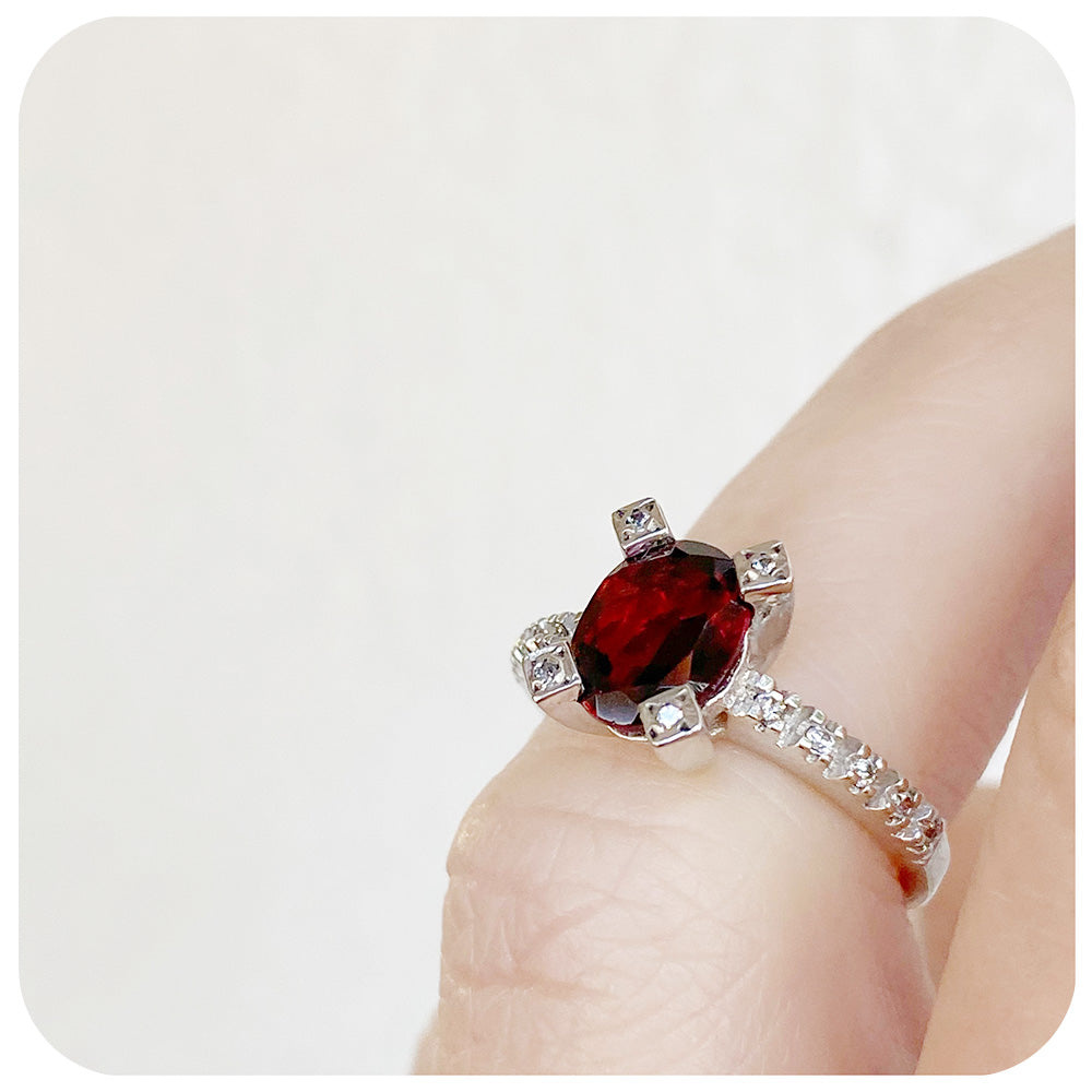 Oval Cut Garnet Ring in Sterling Silver with Cubic Zirconia Detail - Victoria's Jewellery