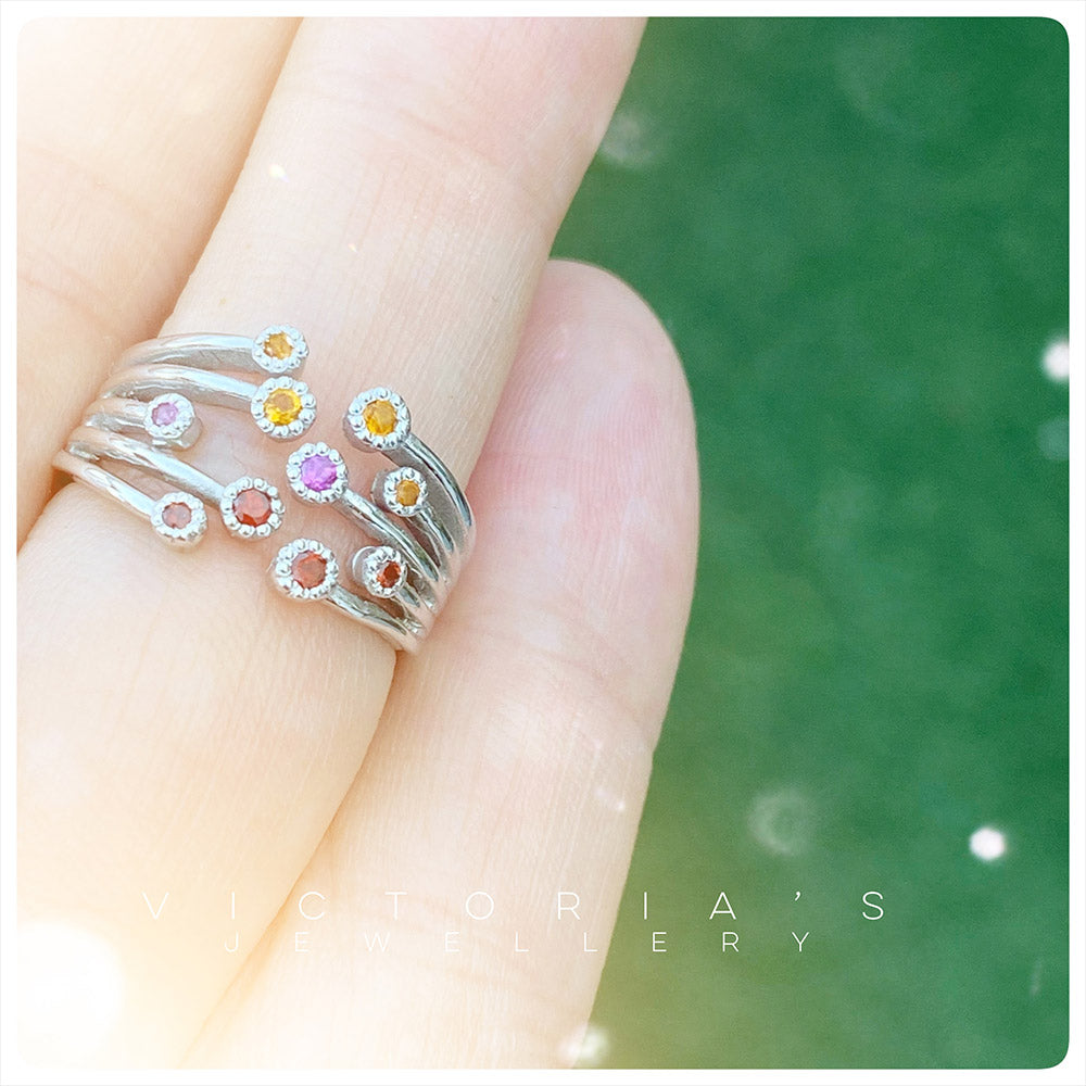 The Red and Yellow Shooting Star Ring - The January Birthstone Edition