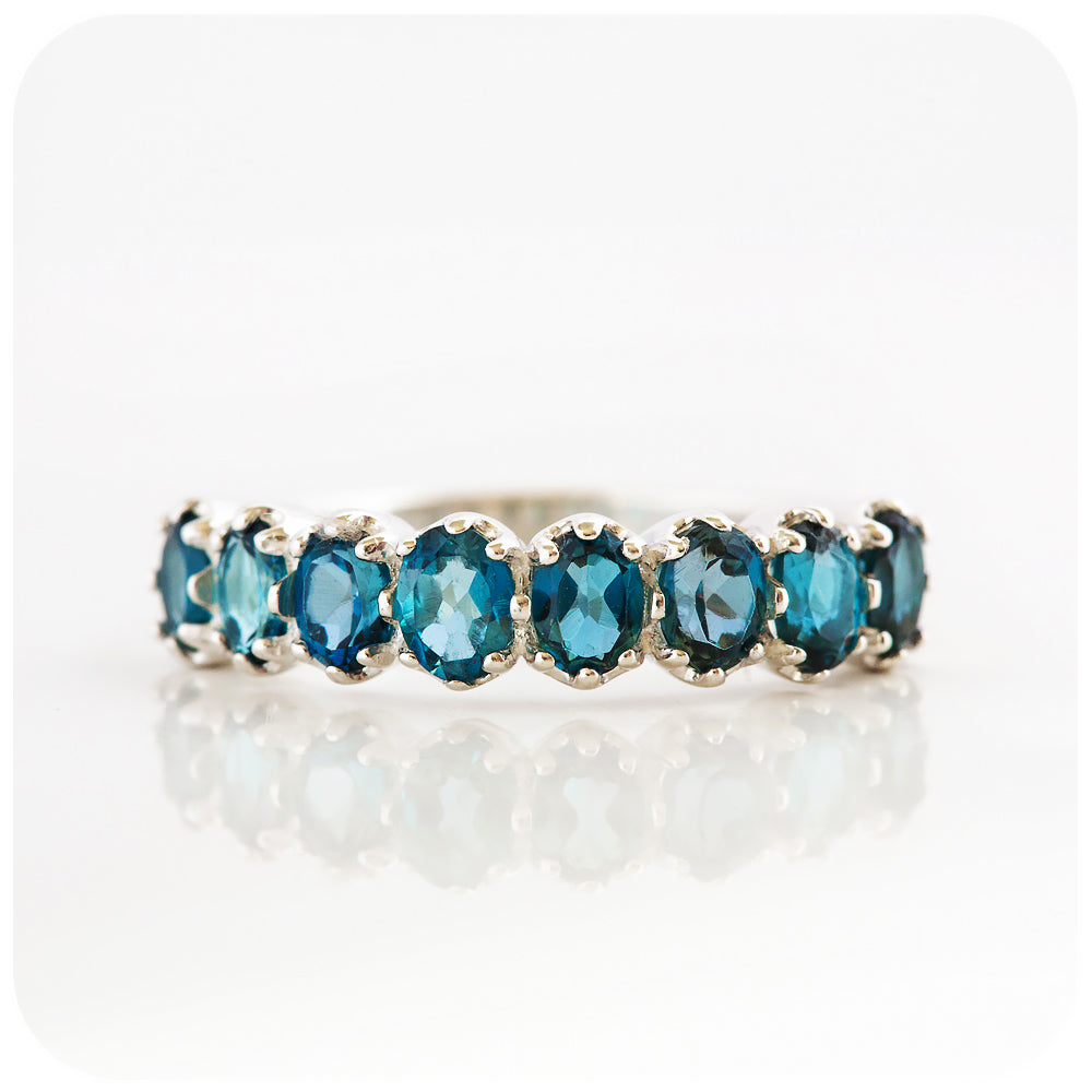 Oval cut London Blue Topaz Half Eternity Ring in Sterling Silver