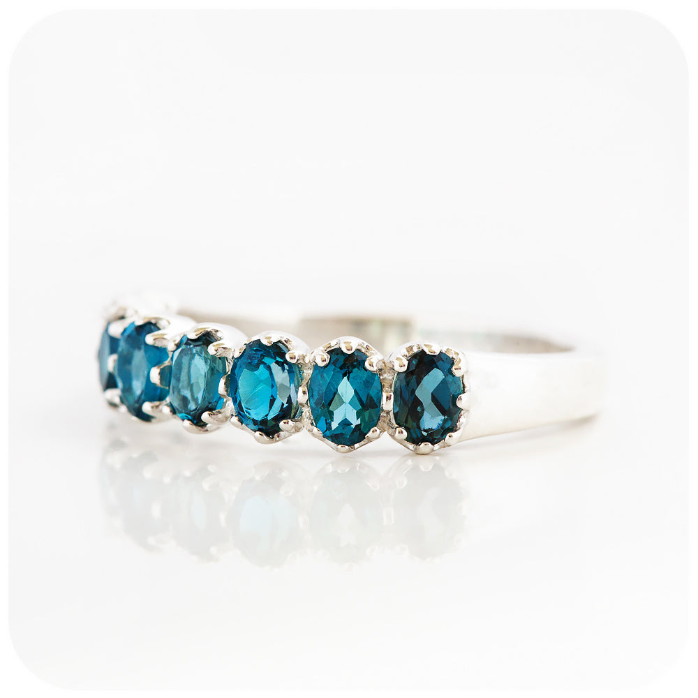 Oval cut London Blue Topaz Half Eternity Ring in Sterling Silver