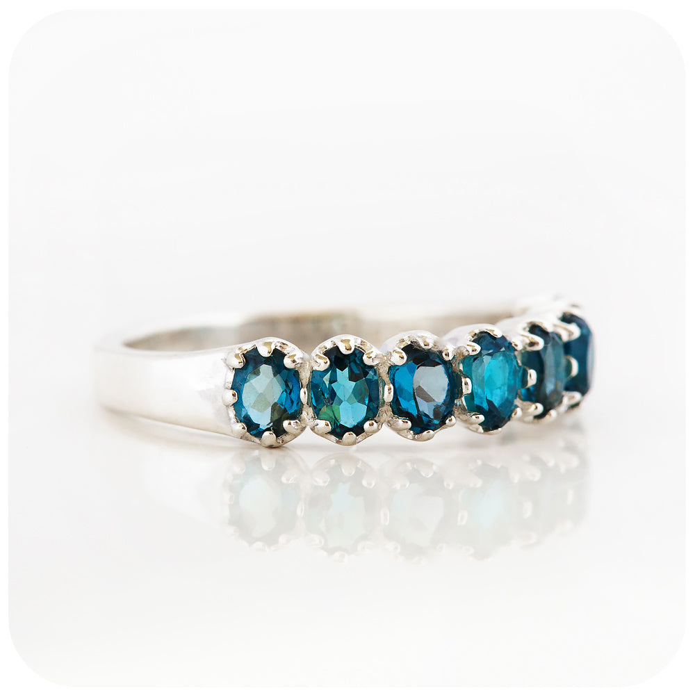 Oval cut London Blue Topaz Half Eternity Ring in Sterling Silver