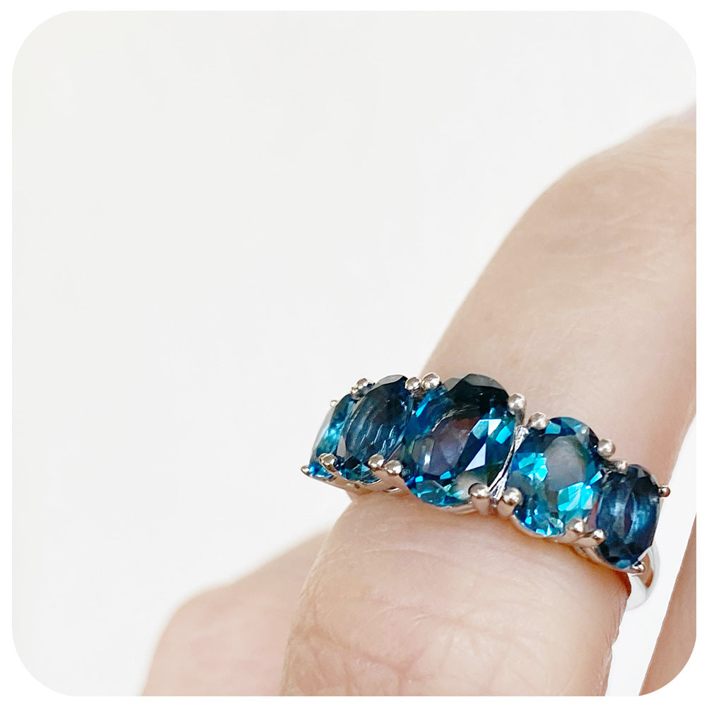Oval cut Graduated Teal London Blue Topaz Half Eternity Anniversary or November Birthstone Ring - Victoria's Jewellery