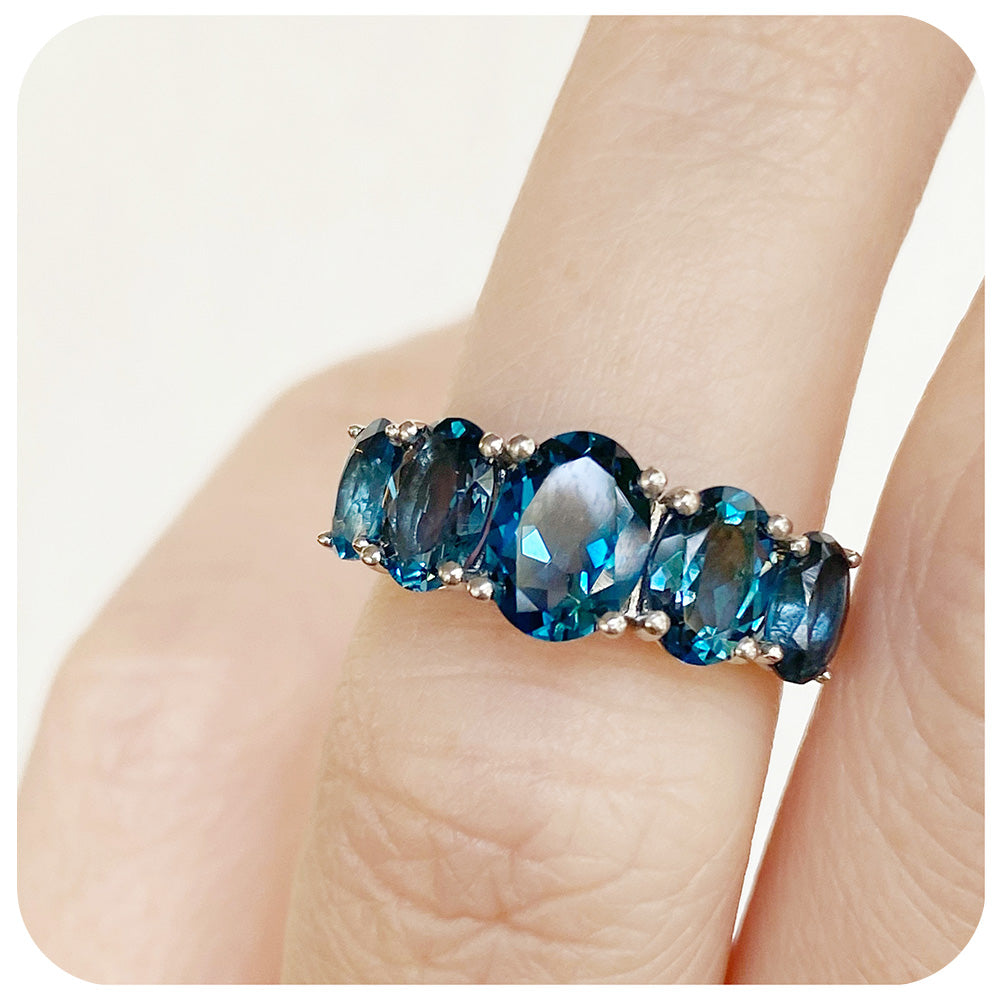 Oval cut Graduated Teal London Blue Topaz Half Eternity Anniversary or November Birthstone Ring - Victoria's Jewellery