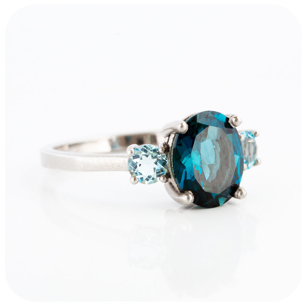 Oval cut London Blue Topaz and Sky Blue Topaz Trilogy Anniversary Ring - Victoria's Jewellery