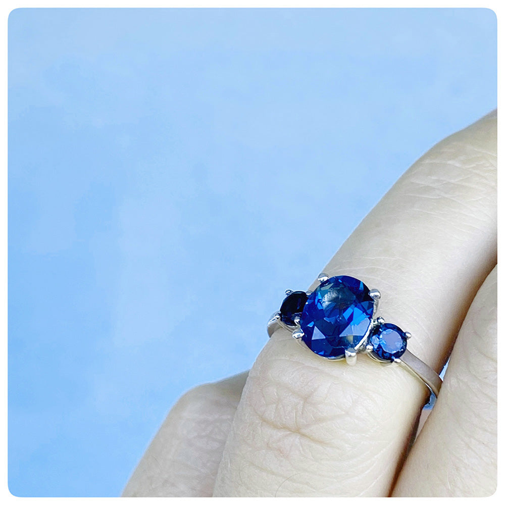 Oval cut London Blue Topaz Trilogy Anniversary Ring - Victoria's Jewellery