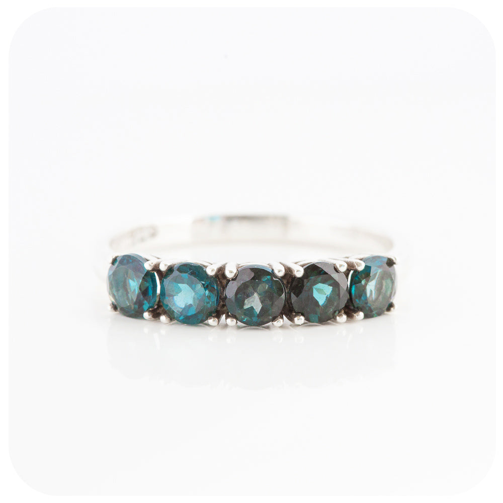 Annie, a London Blue Topaz Half Eternity Ring