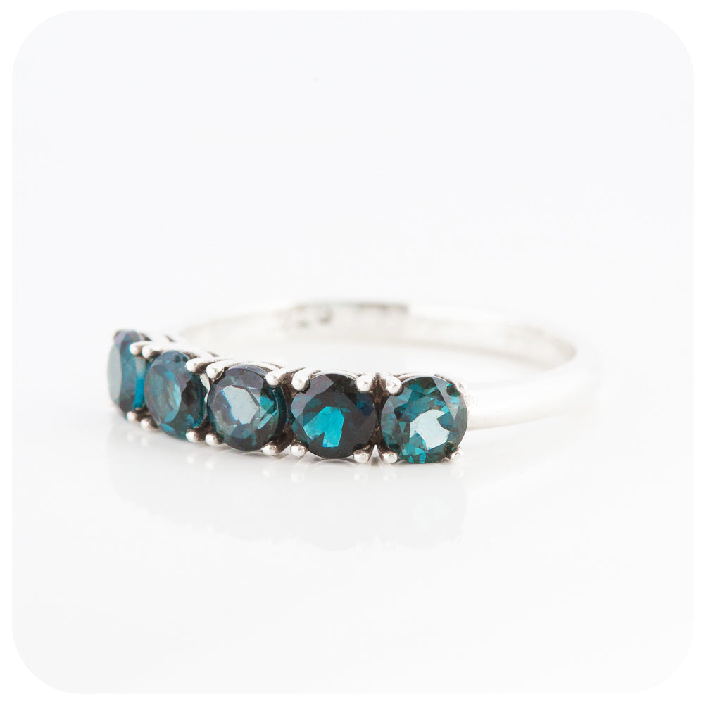 Annie, a London Blue Topaz Half Eternity Ring