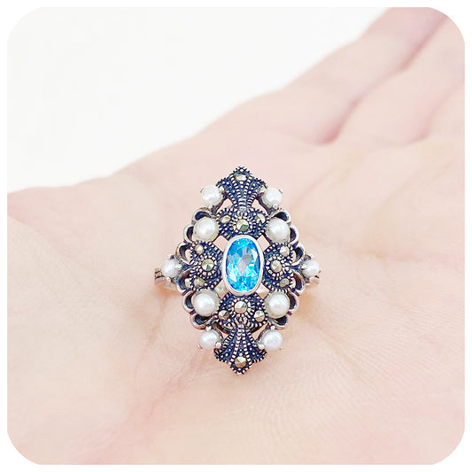 oval cut blue topaz and fresh water pearl vintage inspired ring