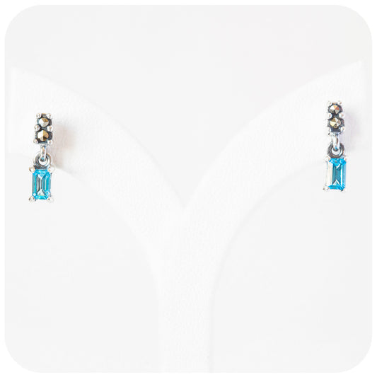 emerald cut swiss blue topaz petite drop stud earrings in sterling silver