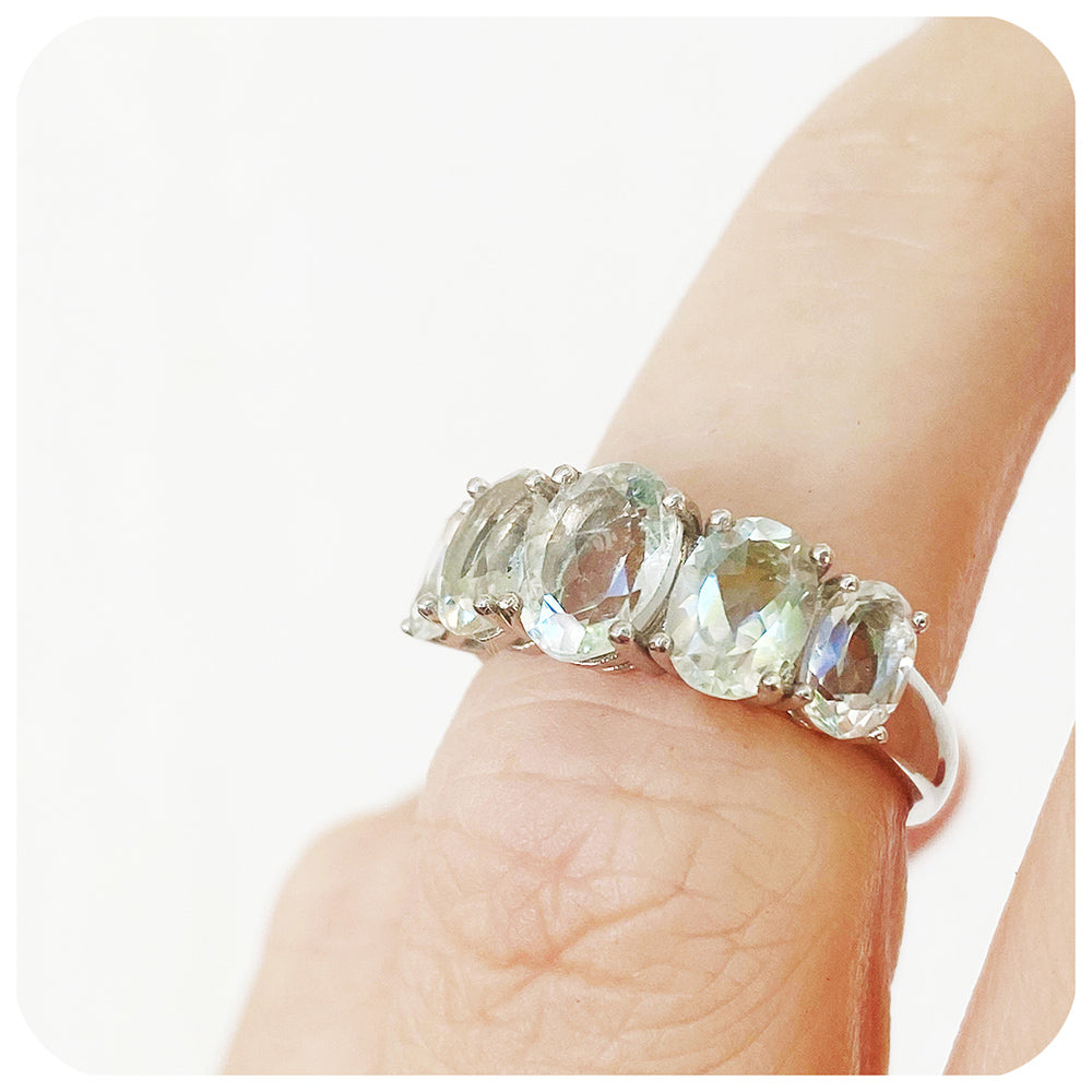 oval cut minty green prasiolite half eternity anniversary ring