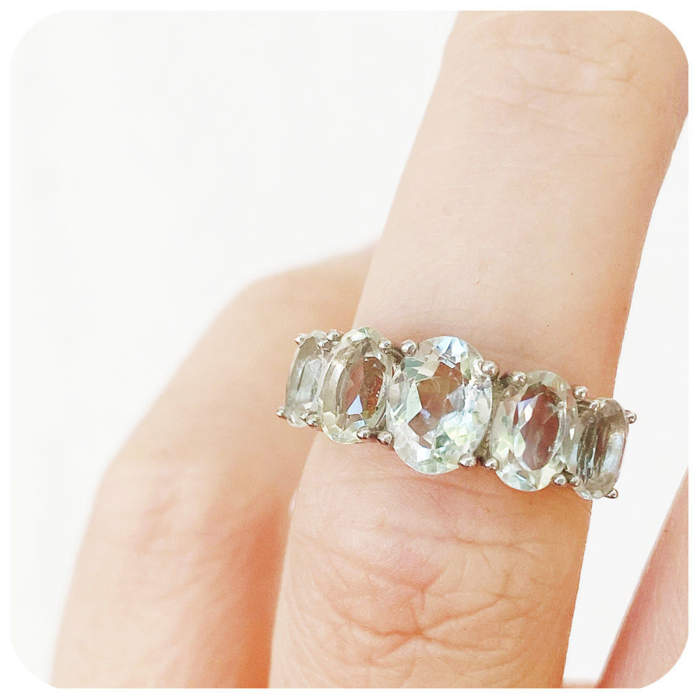 oval cut minty green prasiolite half eternity anniversary ring