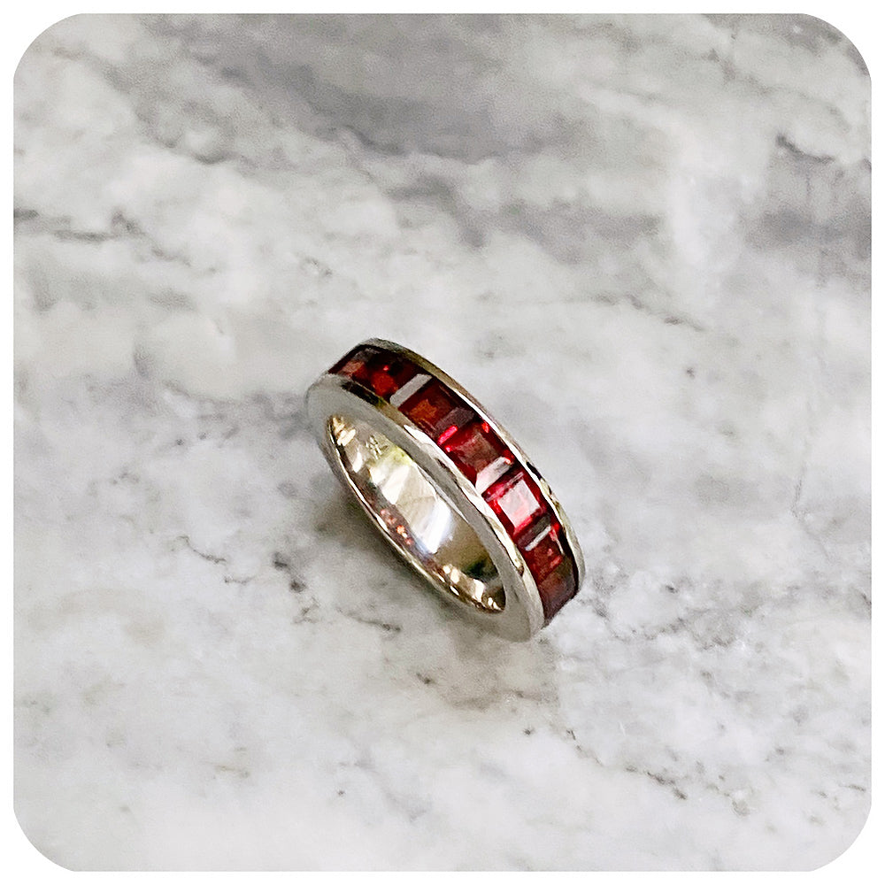 Princess cut Garnet Half Eternity Channel Ring