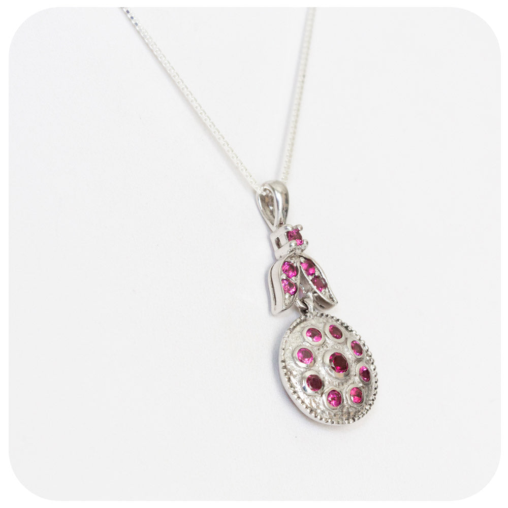 Rhodolite Flower Pendant in Sterling Silver