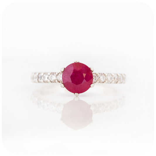 brilliant cut ruby and cubic accent engagement ring