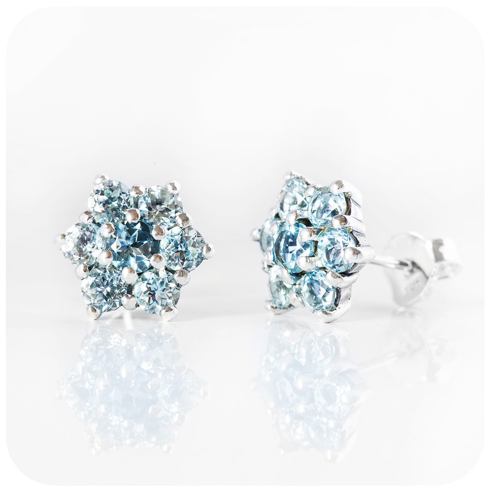 Sky Blue Topaz Flower Stud Earrings in Sterling Silver
