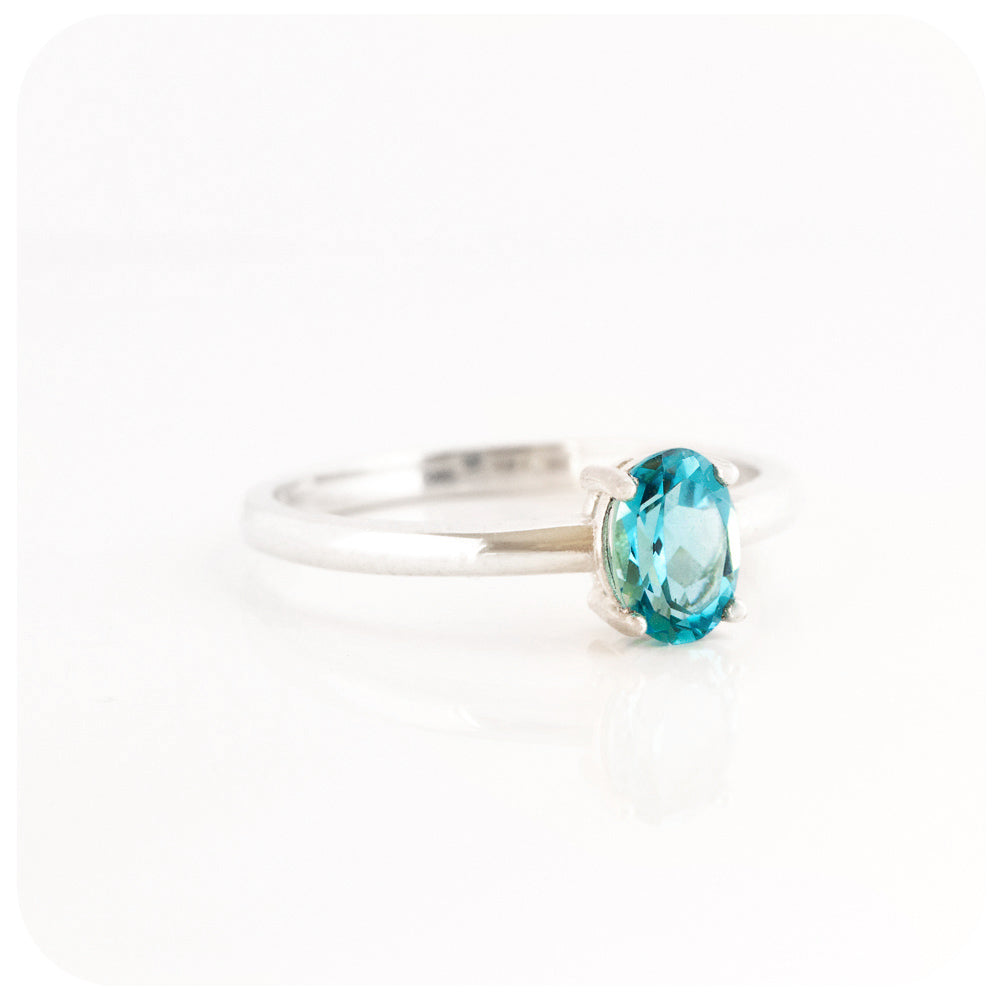 Oval cut Swiss Blue Topaz Solitaire Ring