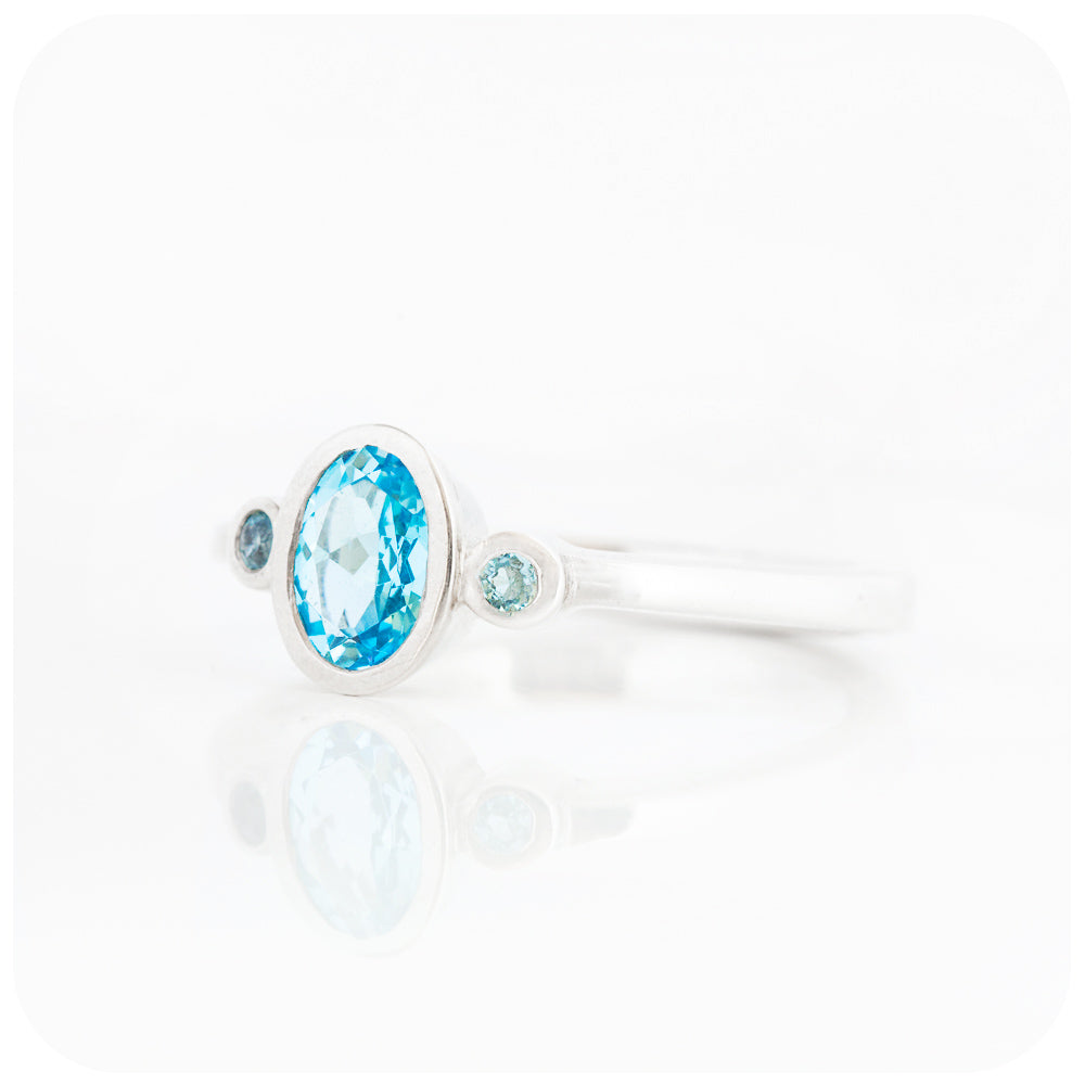 Swiss Blue Topaz Trilogy Ring in Sterling Silver