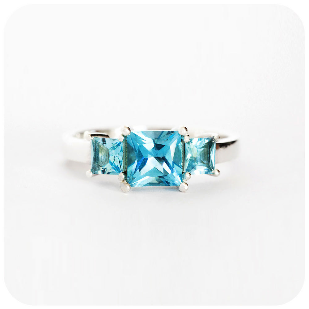 Princess cut Swiss Blue Topaz Trilogy Ring in Sterling Silver