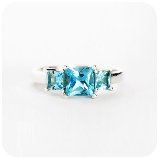 Princess cut Swiss Blue Topaz Trilogy Ring in Sterling Silver