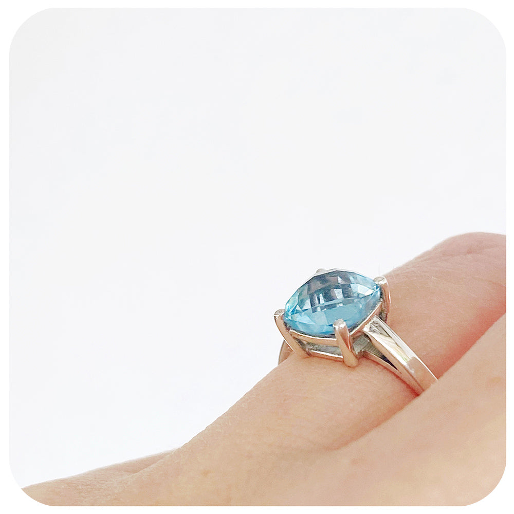 Cushion cut Sky Blue Topaz Solitaire Ring in Sterling Silver