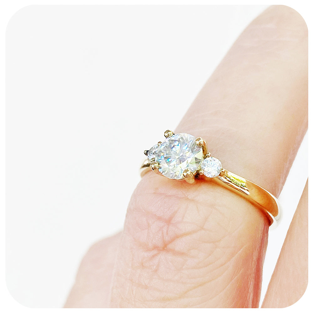 The Lea, a Moissanite Trilogy Engagement Ring