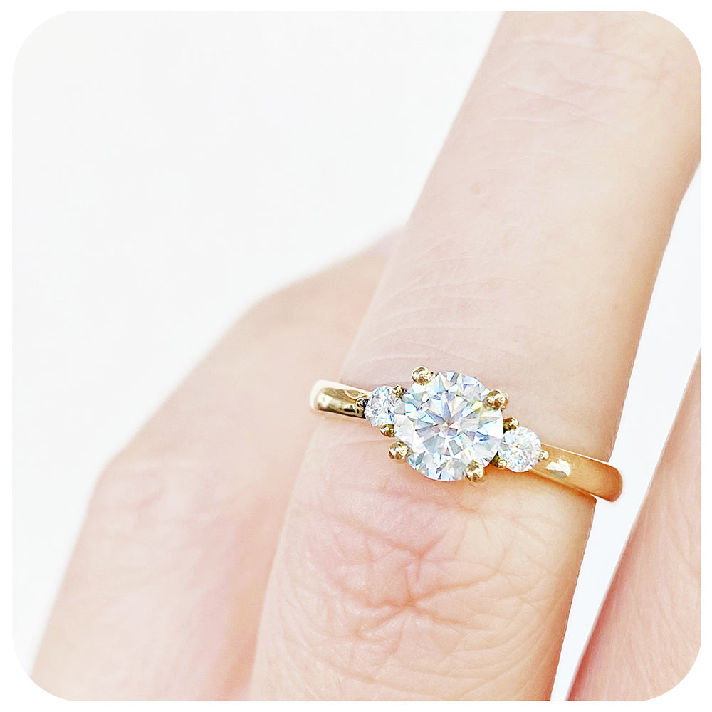 The Lea, a Moissanite Trilogy Engagement Ring