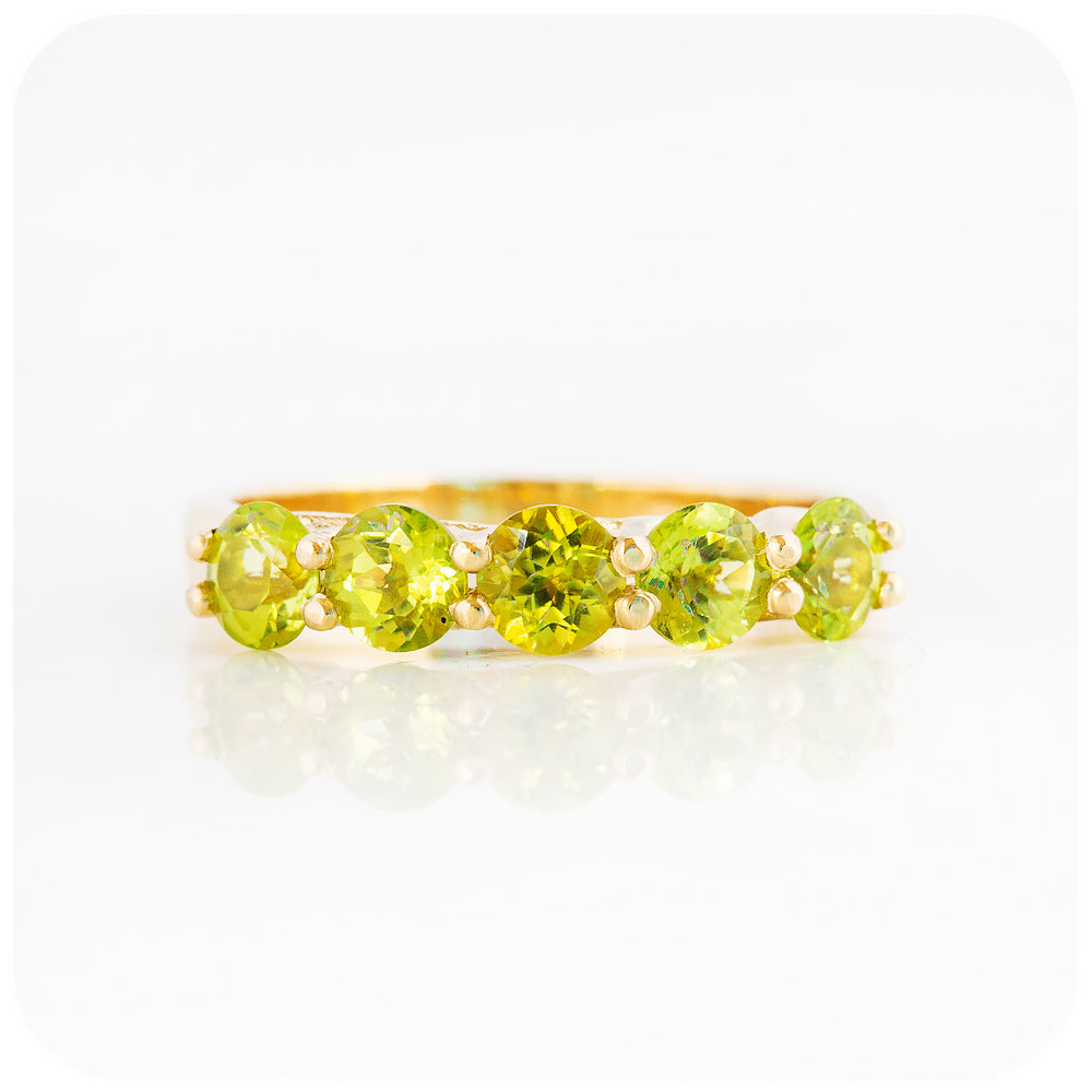 Danelle, a Peridot Half Eternity Trellis Ring