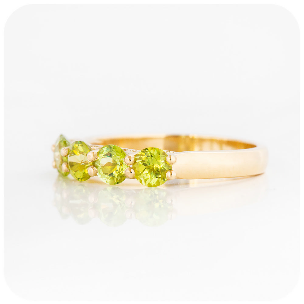 Danelle, a Peridot Half Eternity Trellis Ring