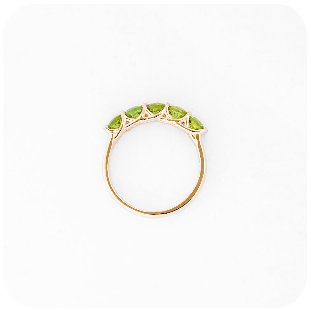 Danelle, a Peridot Half Eternity Trellis Ring
