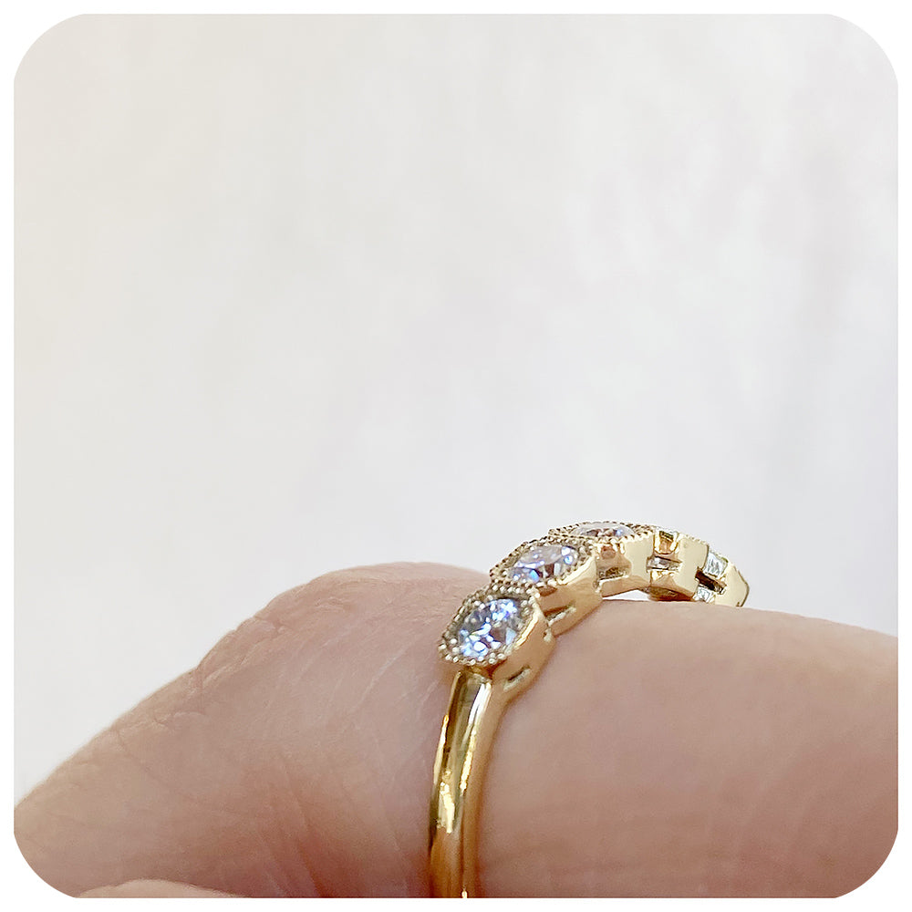 The Zelrese, a Moissanite Half Eternity Ring in Gold