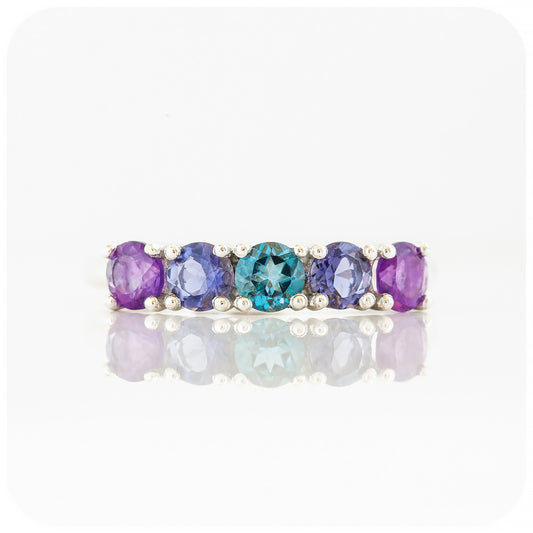 Annie, a Blue and Purple Half Eternity Ring