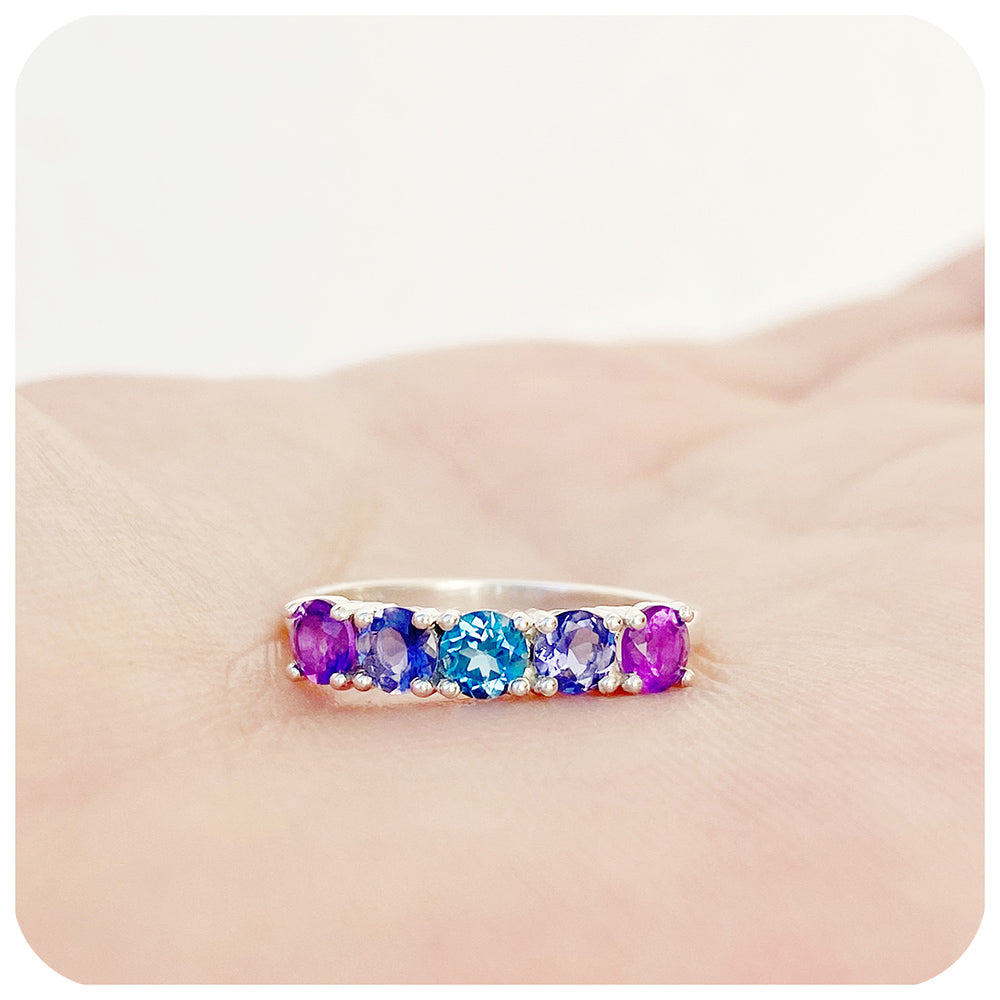 Annie, a Blue and Purple Half Eternity Ring