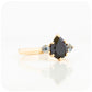 black pear cut spinel and round cut aquamarine trilogy style engagement ring in yellow gold - Victoria's Jewellery