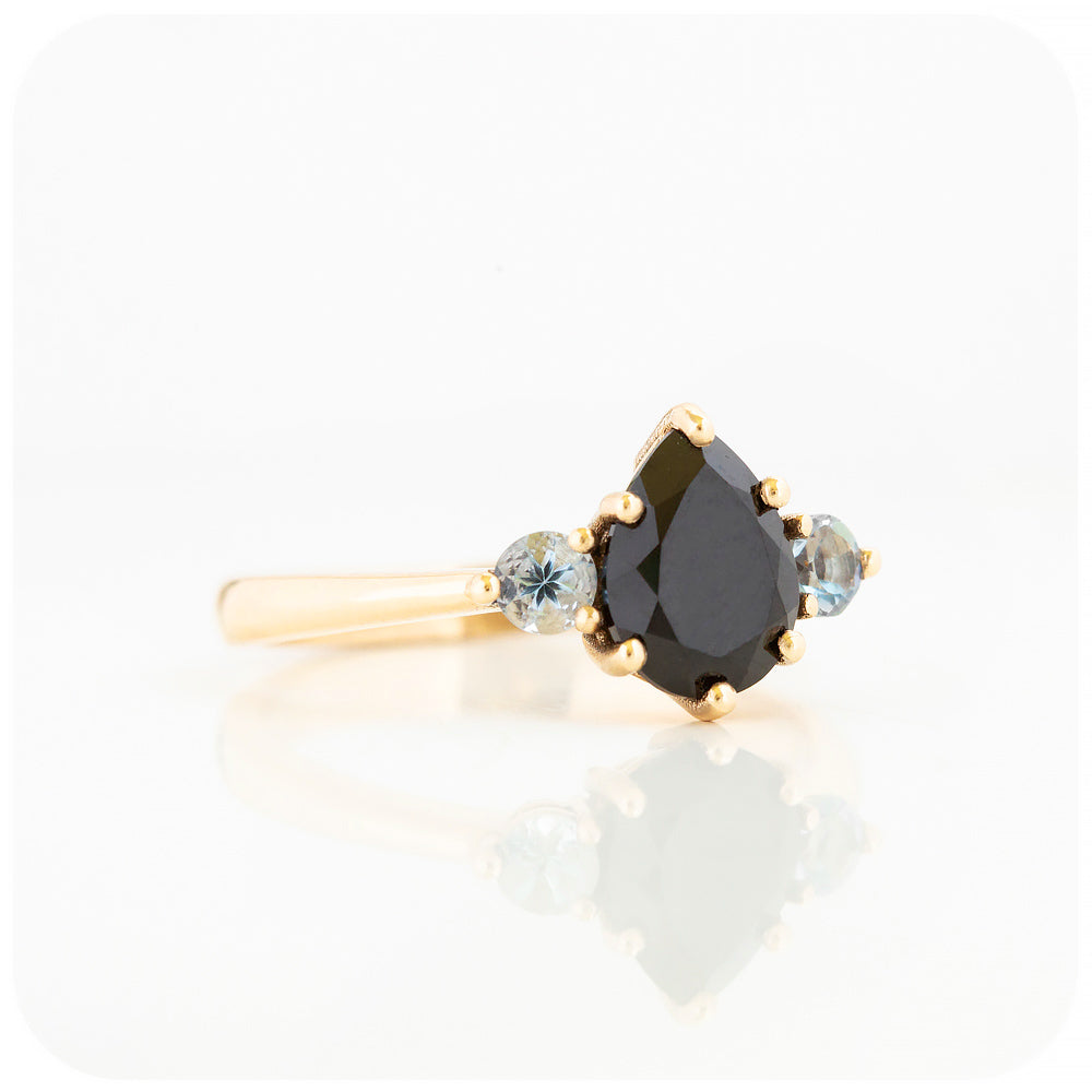 Sienna, a Black Moissanite and Aquamarine Trilogy Ring