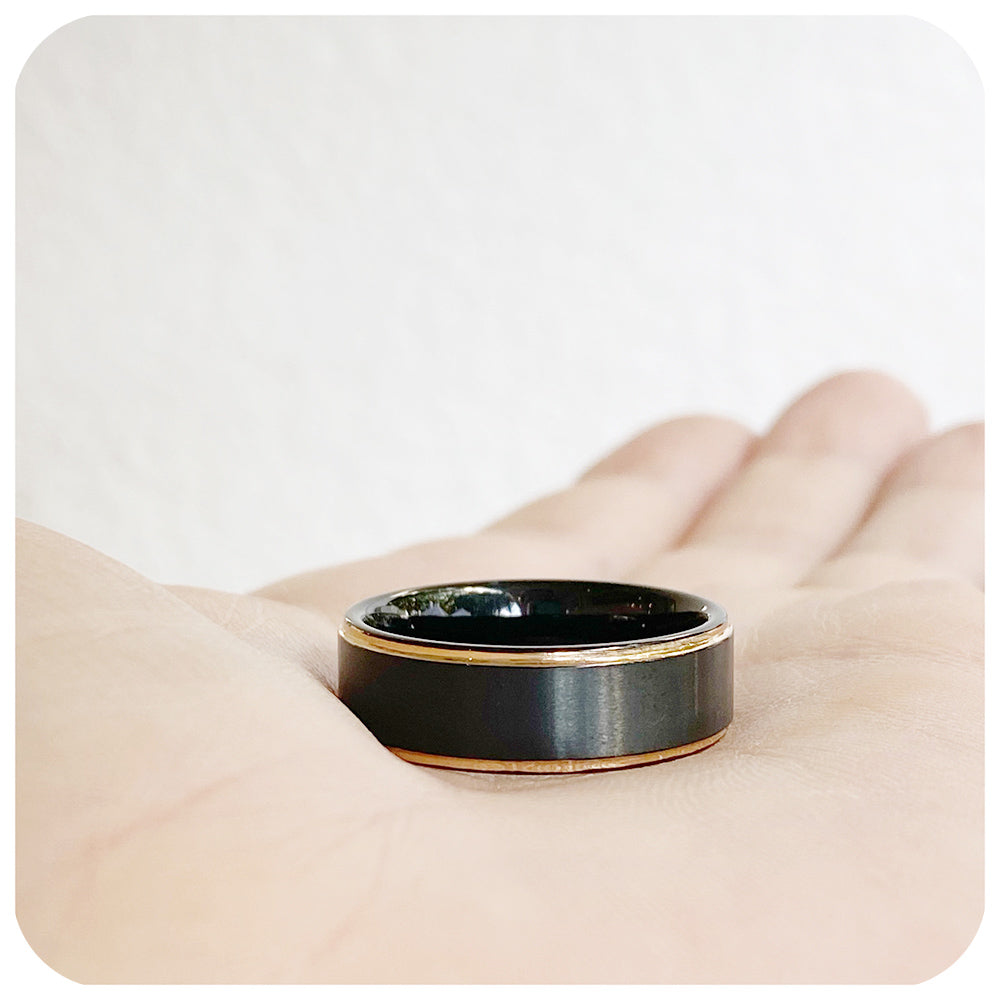 Ryder, a Black Tungsten Men's Ring with Rose Gold Plated Edges - 8mm