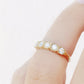 Zelrese, a Mined Diamond Half Eternity Ring