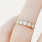 Zelrese, a Mined Diamond Half Eternity Ring