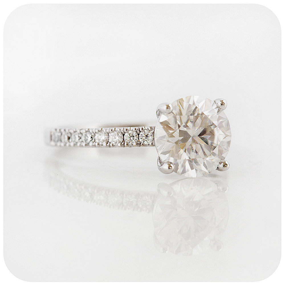 brilliant round cut moissanite engagement ring with moissanite accent stones - Victoria's Jewellery