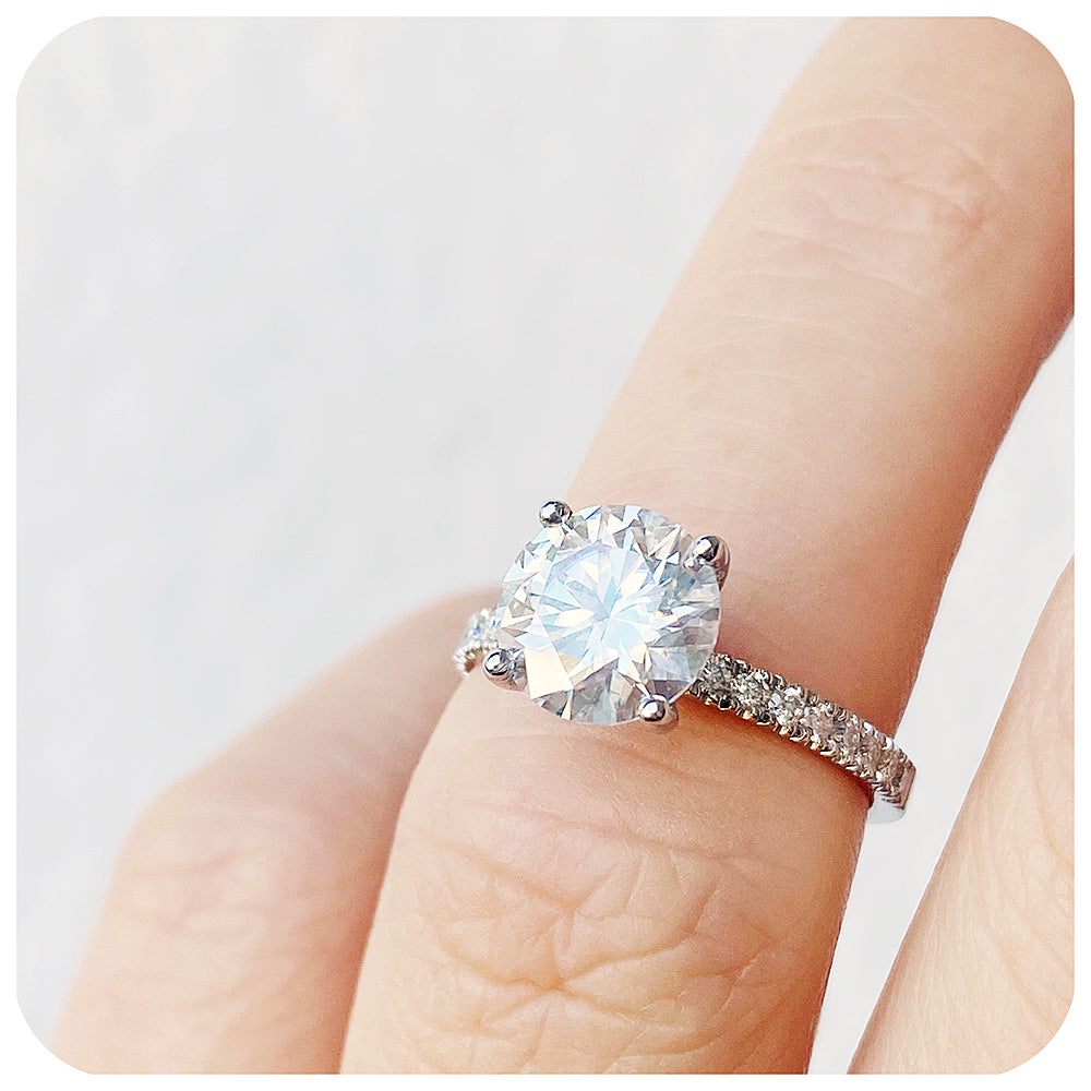 brilliant round cut moissanite engagement ring with moissanite accent stones - Victoria's Jewellery