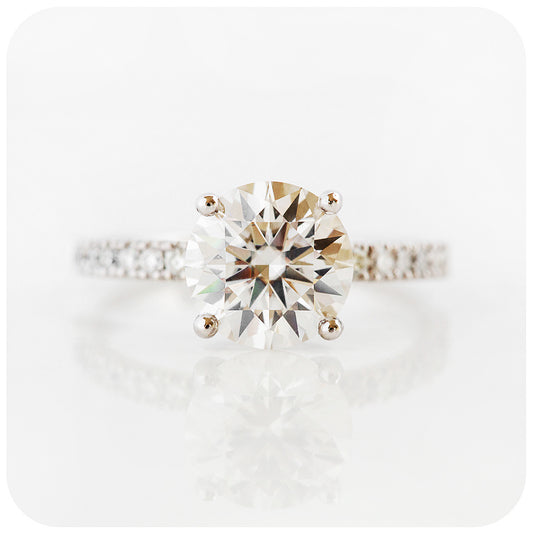 brilliant round cut moissanite engagement ring with moissanite accent stones - Victoria's Jewellery