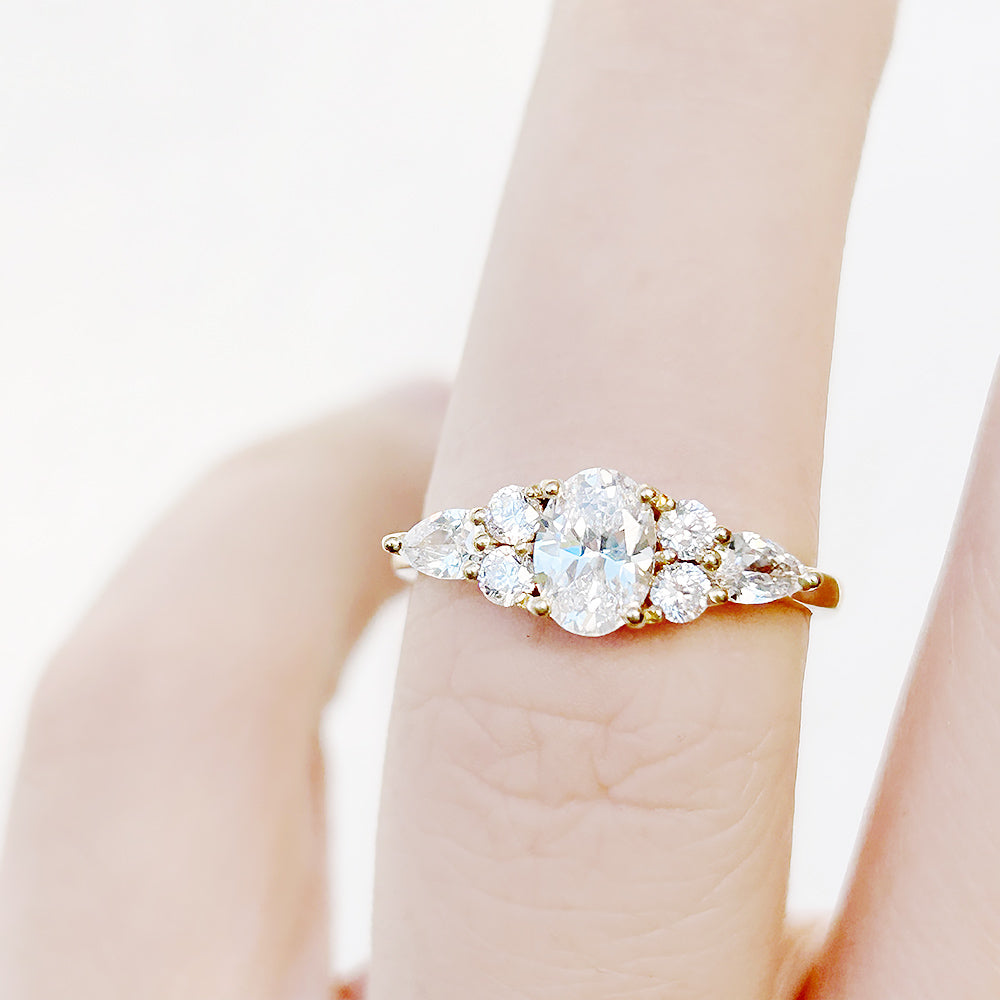 Oval cut Diamond cluster Engagement Ring in Yellow Gold - Victoria's Jewellery