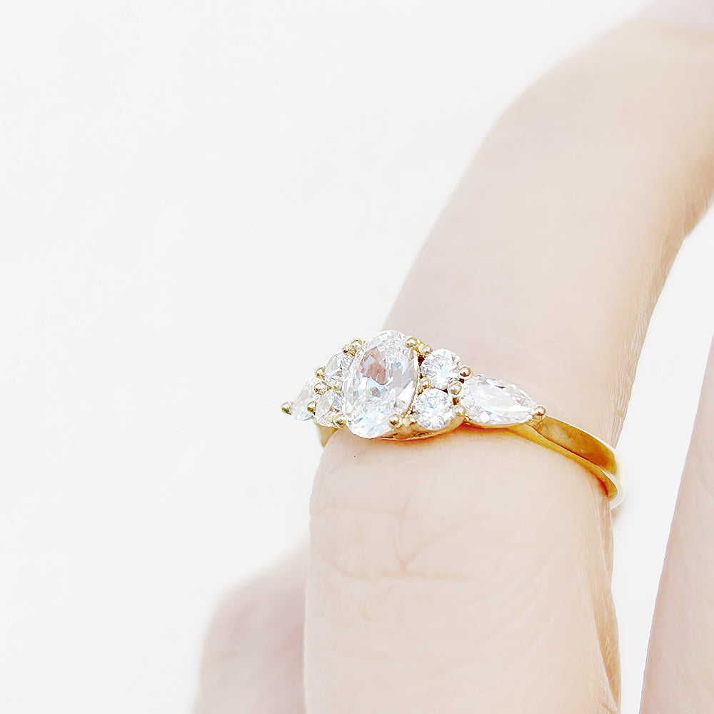 Oval cut Diamond cluster Engagement Ring in Yellow Gold - Victoria's Jewellery