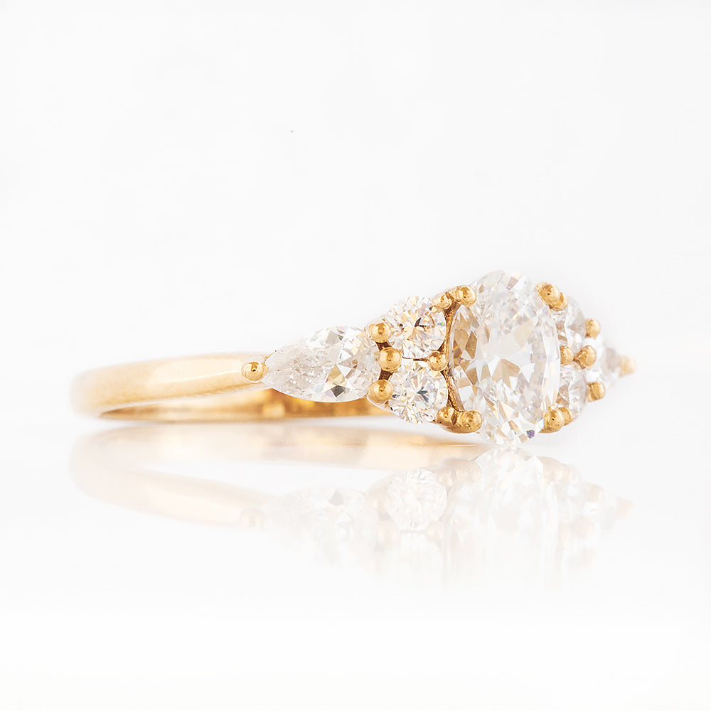 Oval cut Diamond cluster Engagement Ring in Yellow Gold - Victoria's Jewellery
