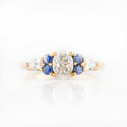 Diamond and Sapphire Trellis Cluster Engagement Ring in Yellow Gold