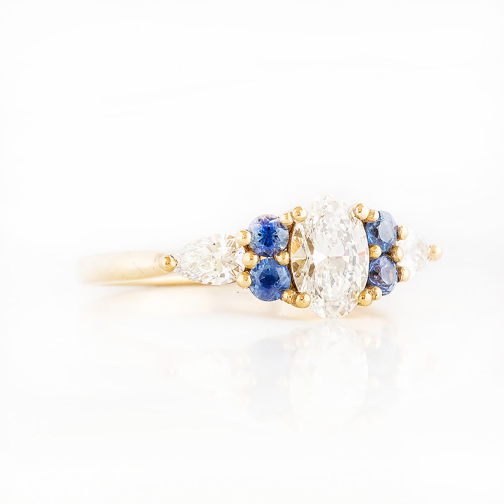 Diamond and Sapphire Trellis Cluster Engagement Ring in Yellow Gold