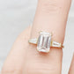 Carmen, an Emerald cut Trilogy Ring