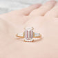 Carmen, an Emerald cut Trilogy Ring