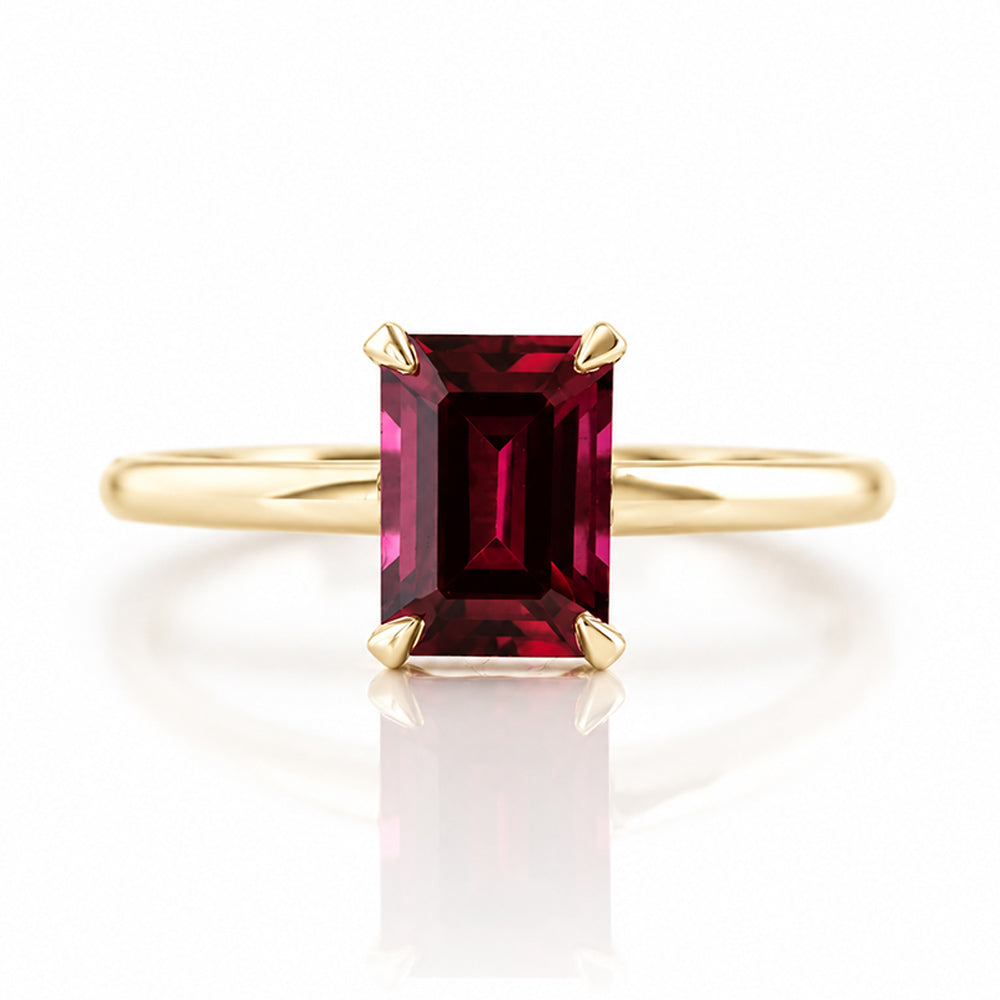 Mari, an Emerald cut Rhodolite Solitaire Ring