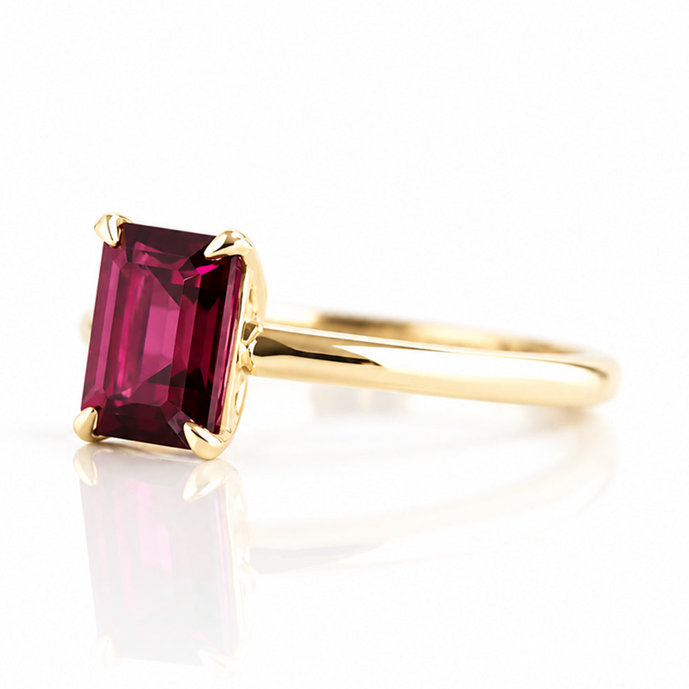 Mari, an Emerald cut Rhodolite Solitaire Ring